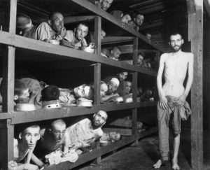Buchenwald in 1945 after the Allies liberated it. Wiesel is in the second row from the bottom, seventh from the left, next to the bunk post