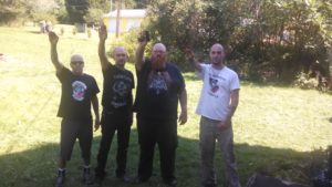 Ronald "Dozer" Pulcher with other members of Aryan Strikeforce. For the record, Pulcher had no business with that gun in his hand being an ex-con and all.